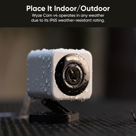 Wyze Cam v4 gray camera in a promotional image